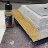 Airbrushen des Sandes und des Sandsteines.