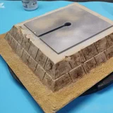 Der Sand erhält einen Dry-Brush mit gelb.